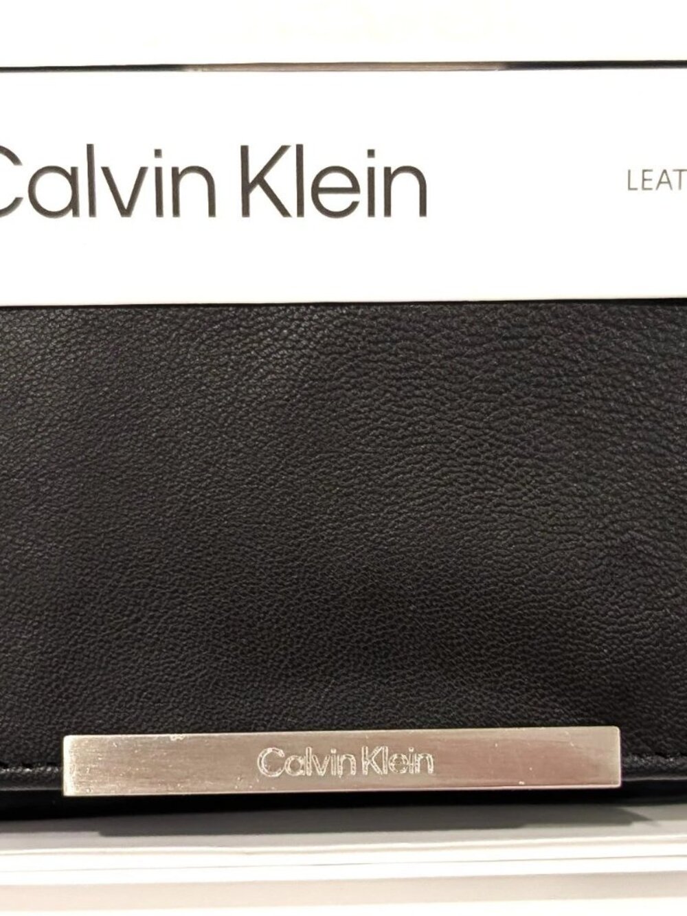 Calvin Klein Mens Leather Trifold Wallet Metal Logo Bar Black NIB NWT